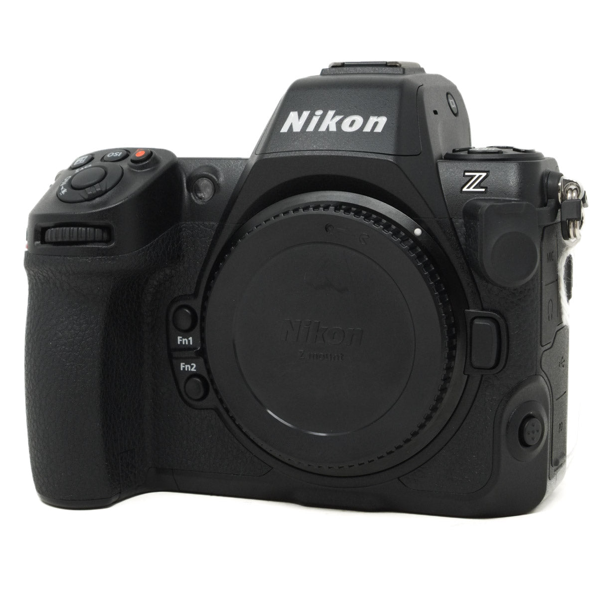 Black Nikon camera body on a white background