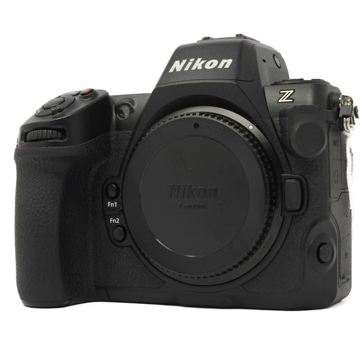 Black Nikon camera body on a white background