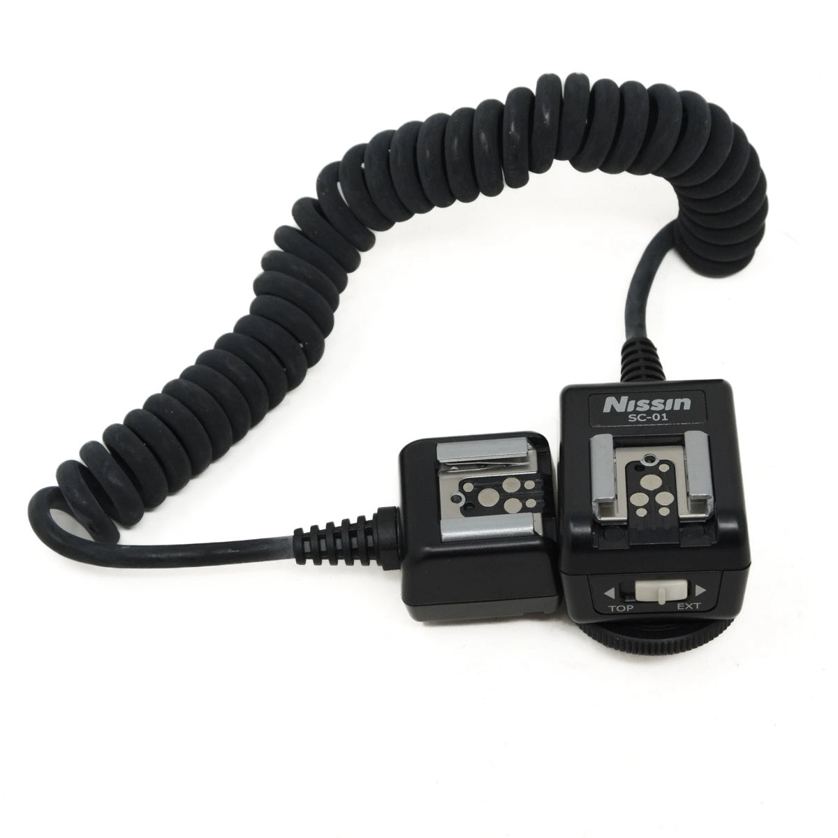 Nissin camera universal shoe cord with coiled cable on a white background