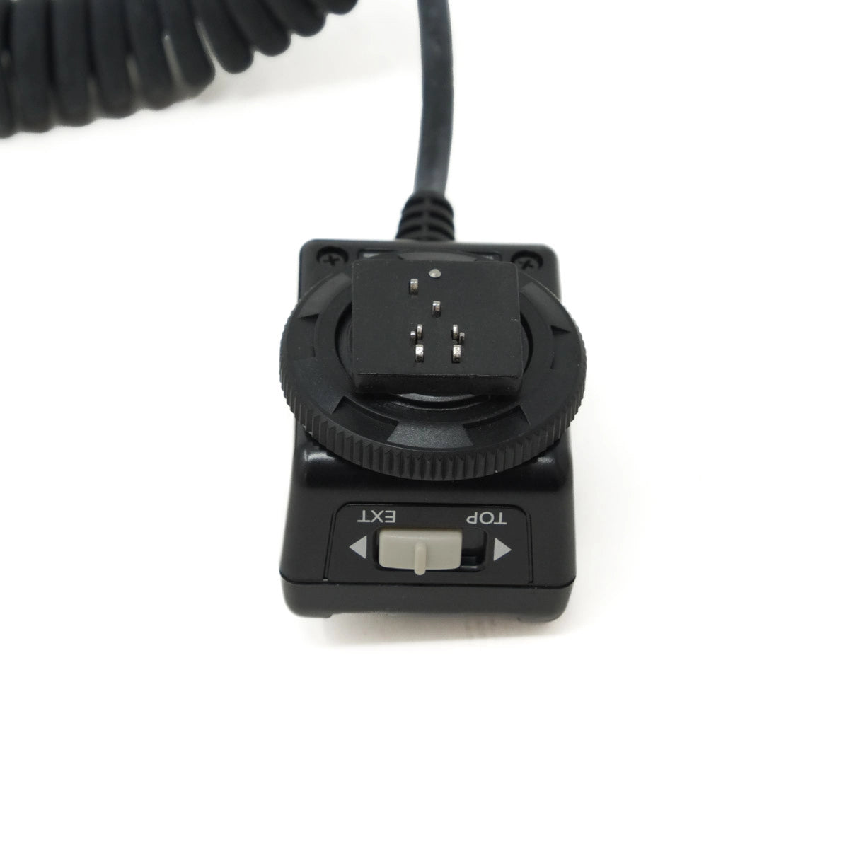 Nissin camera universal shoe cord with coiled cable on a white background