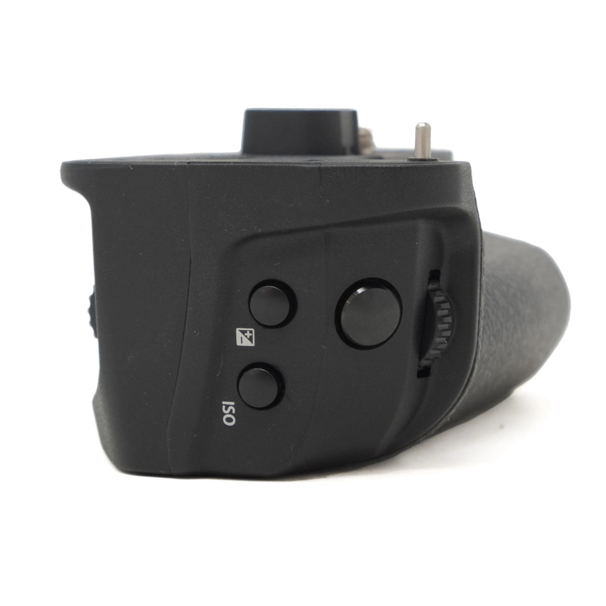 Close-up of a black camera grip with control buttons on a white background