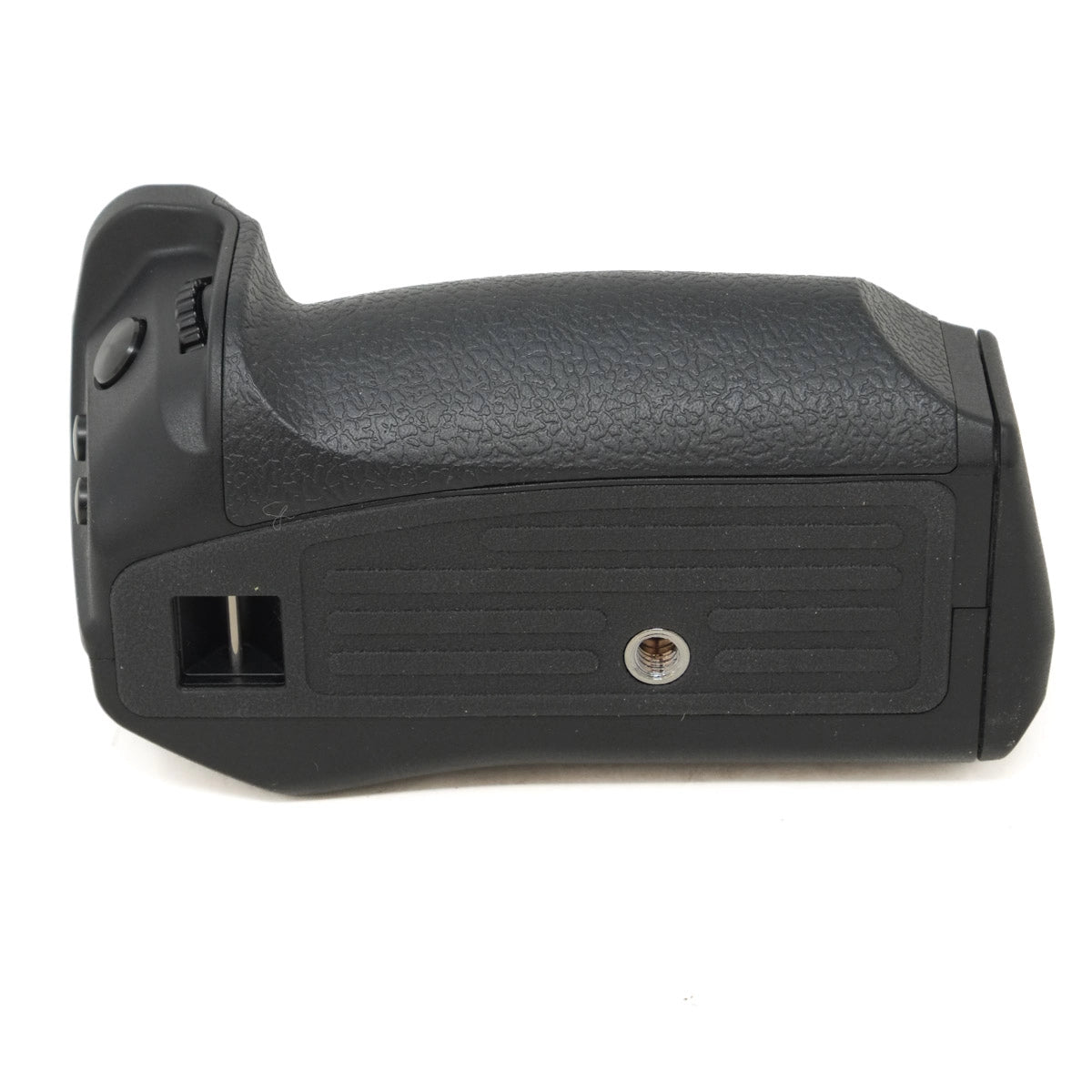 Black camera battery grip on a white background