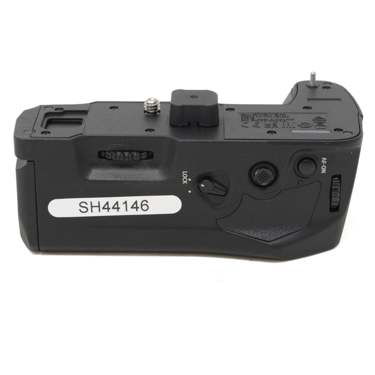 Black camera battery grip with visible branding on a white background