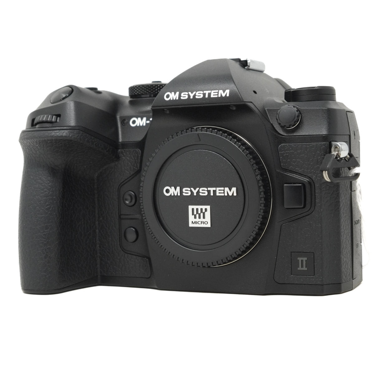 Black camera body with 'OM System' branding on a white background