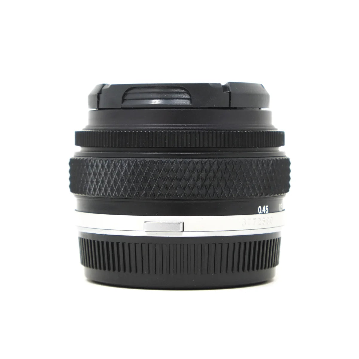 Used Olympus Auto-S 50mm f1.8 prime lens - side angle