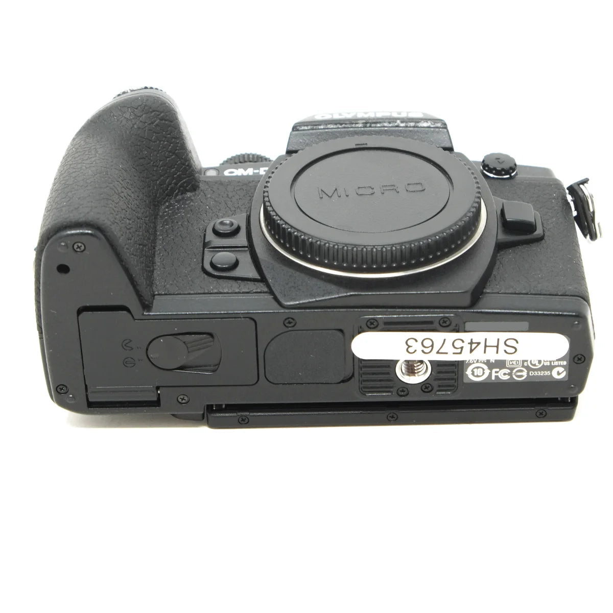 Used Olympus E-M1 Mirrorless camera with Spare OM Battery - bottom angle