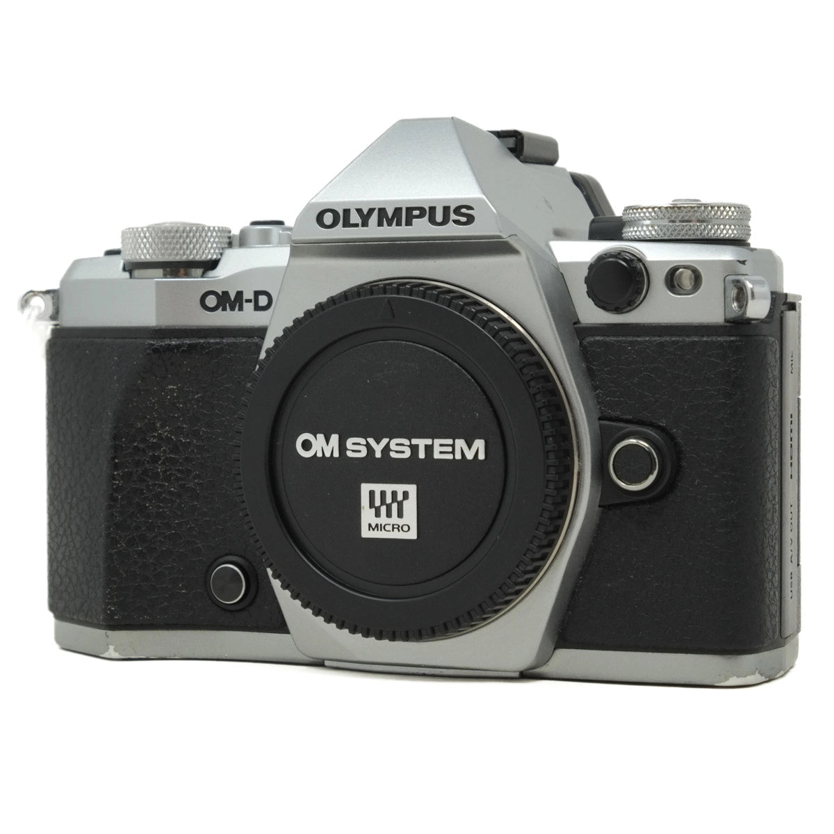 Olympus camera body on a white background