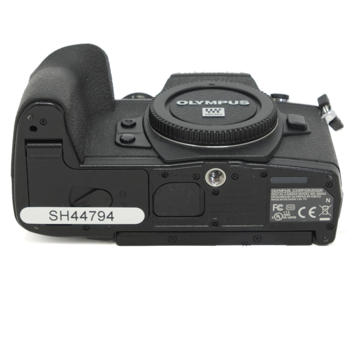 Olympus camera body on a white background