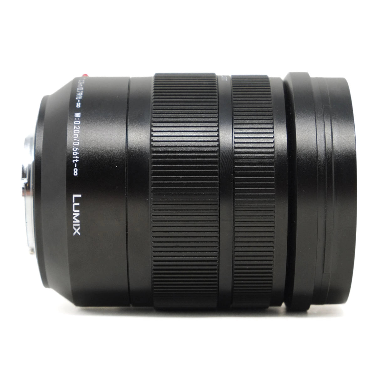 Black camera lens with 'LUMIX' branding on a white background