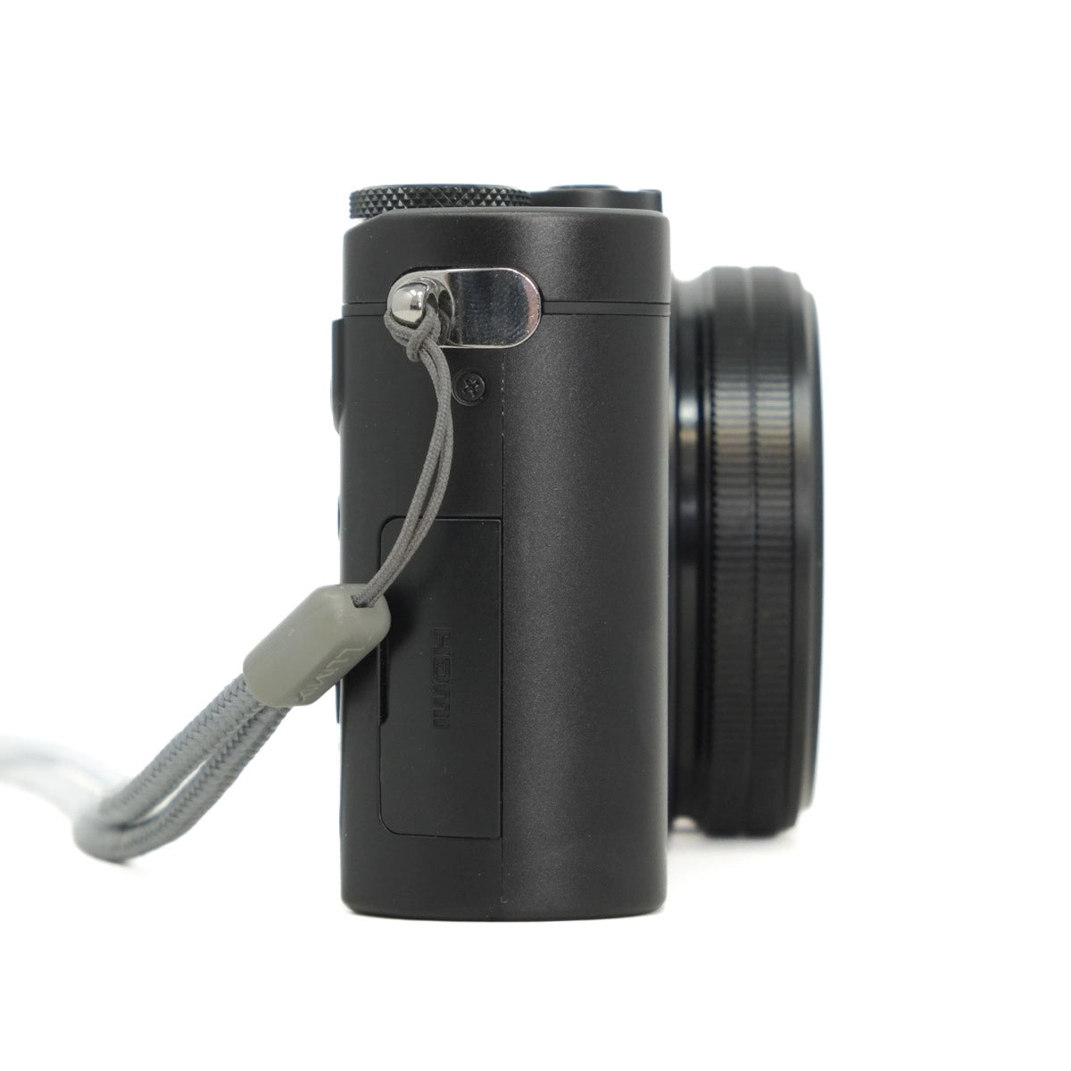 Black camera with a strap on a white background