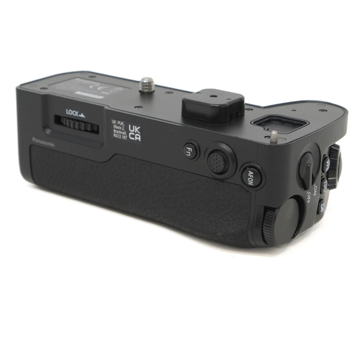 Black camera battery grip on a white background