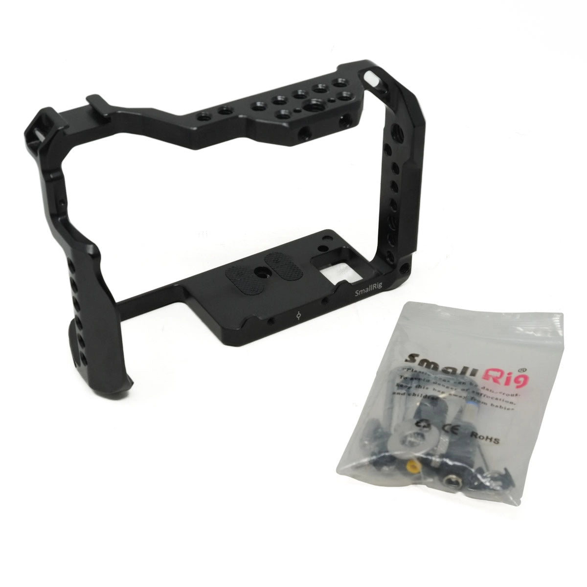 Black camera cage with a SmallRig branded accessory bag on a white background