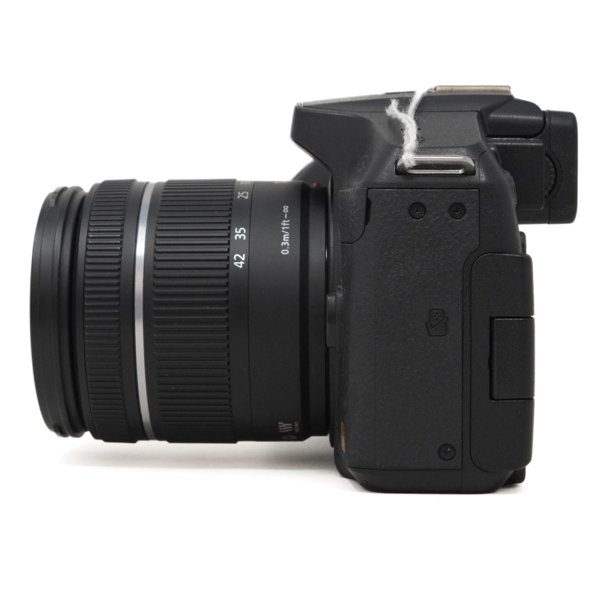 Black camera with lens on a white background