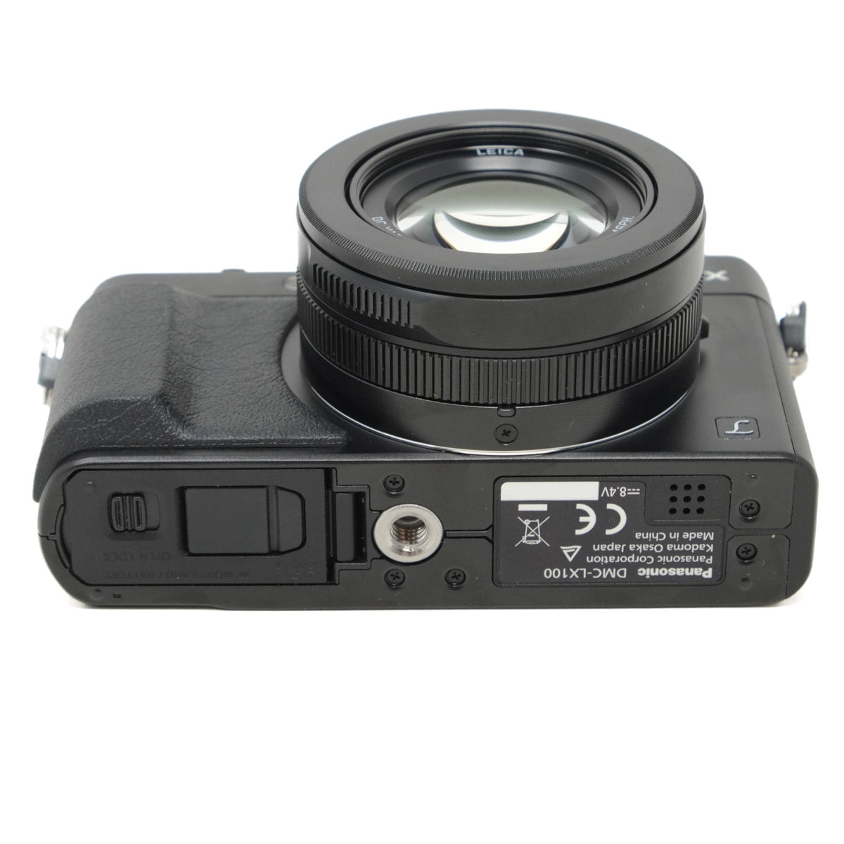 Camera lens and body on a white background