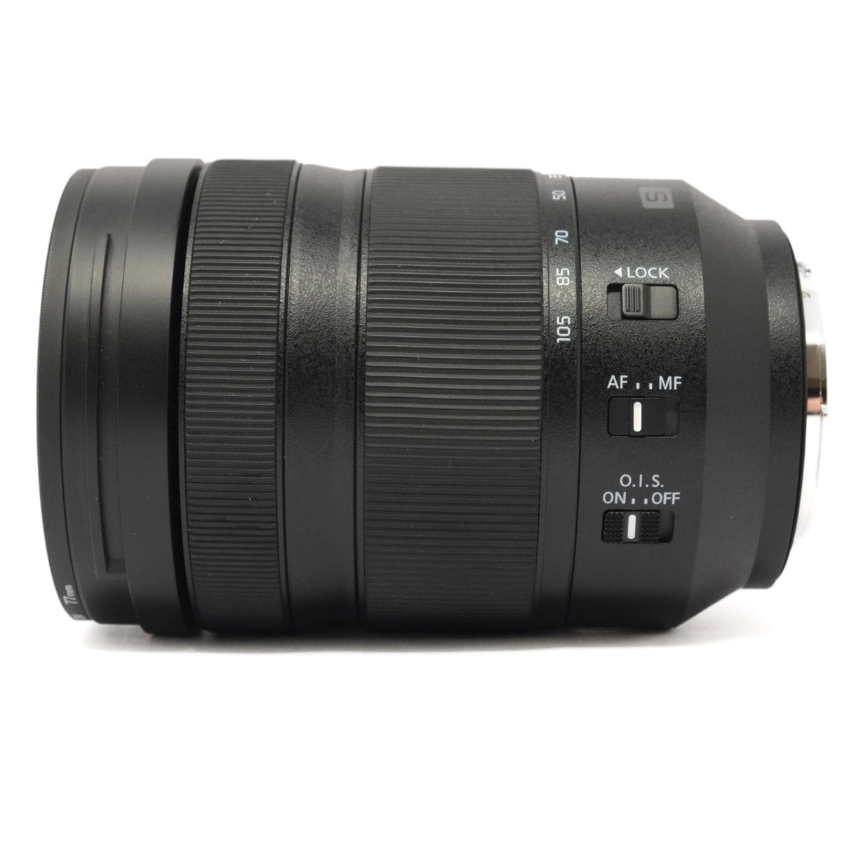 Black camera lens on a white background