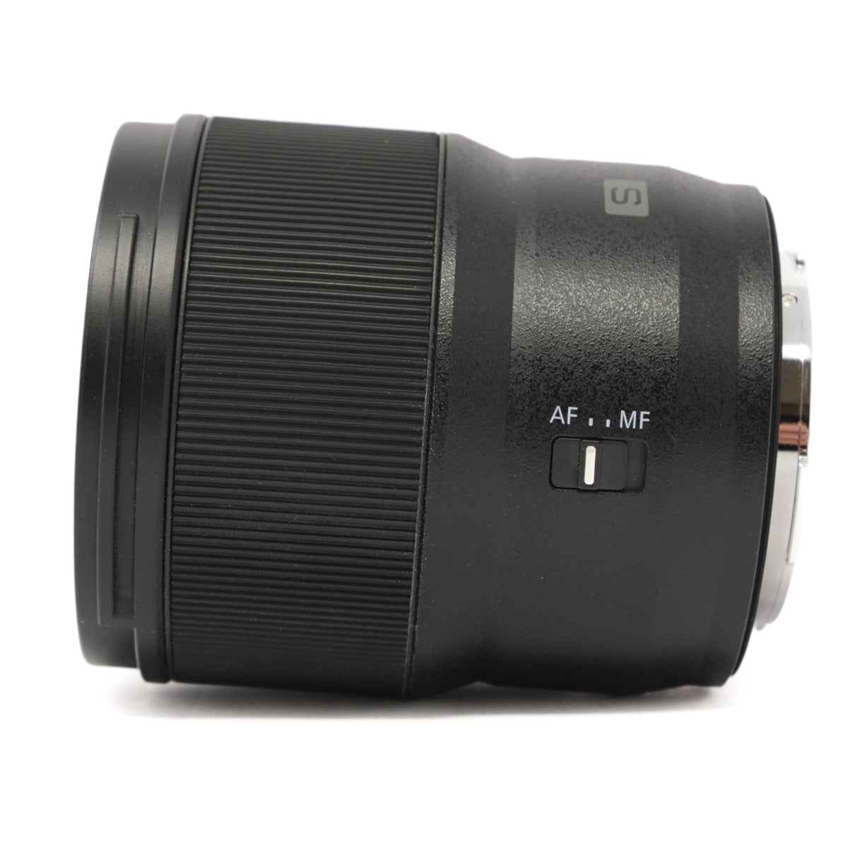 Camera lens with focus switch on a white background