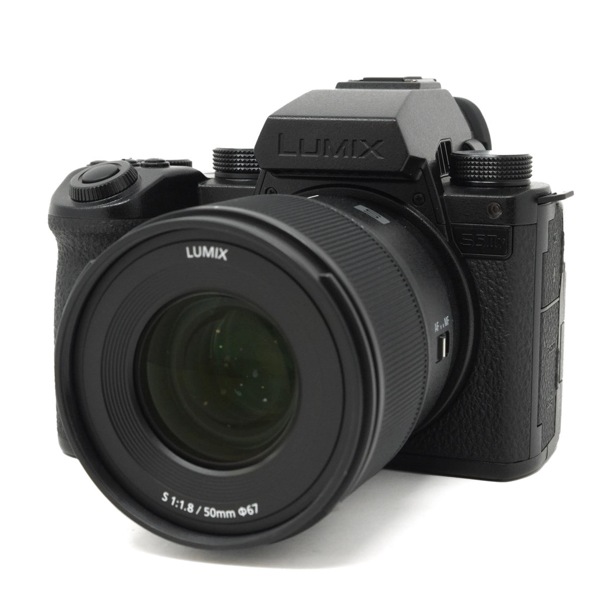 Black Panasonic Lumix camera on a white background