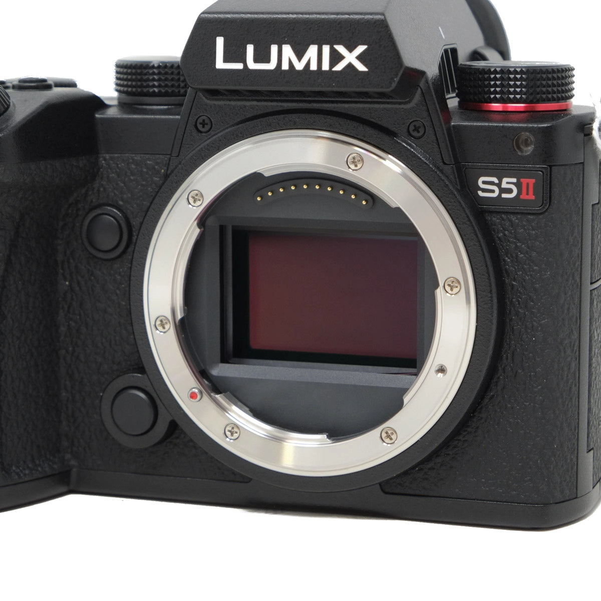 Panasonic Lumix camera body with lens mount on a white background