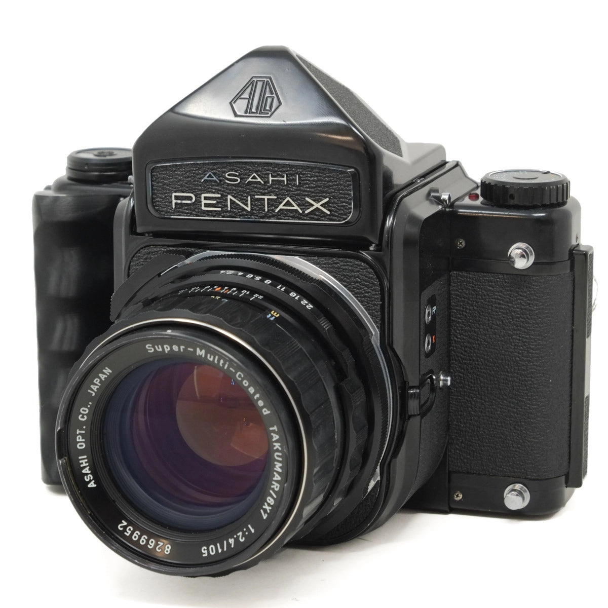 Vintage Asahi Pentax camera with lens on a white background