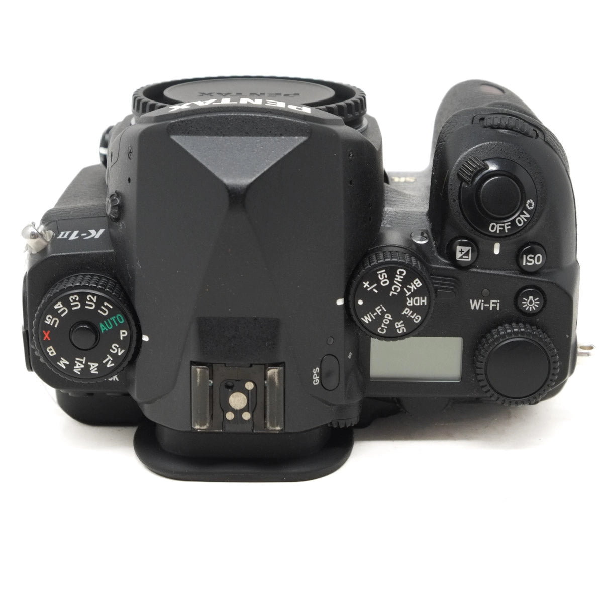 Black DSLR camera on a white background