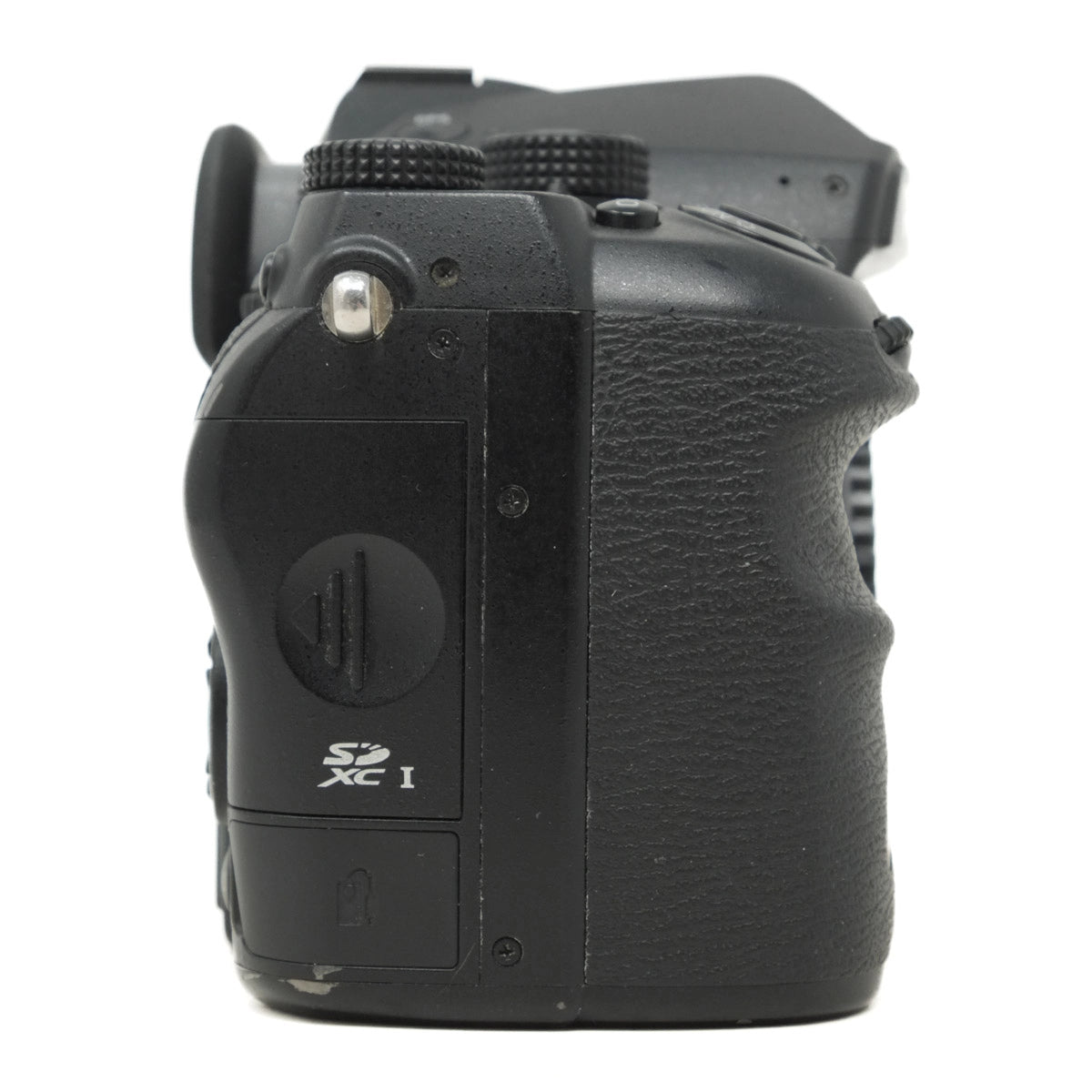 Black camera body with SD card slot on a white background
