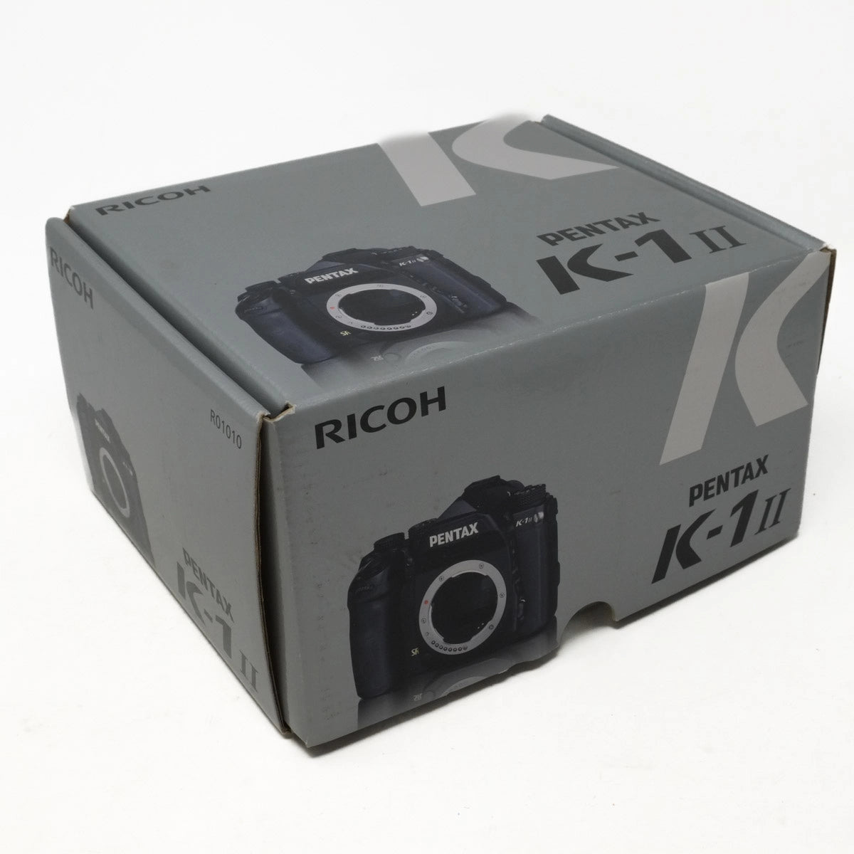 Ricoh Pentax K-1 II camera packaging box on a white background