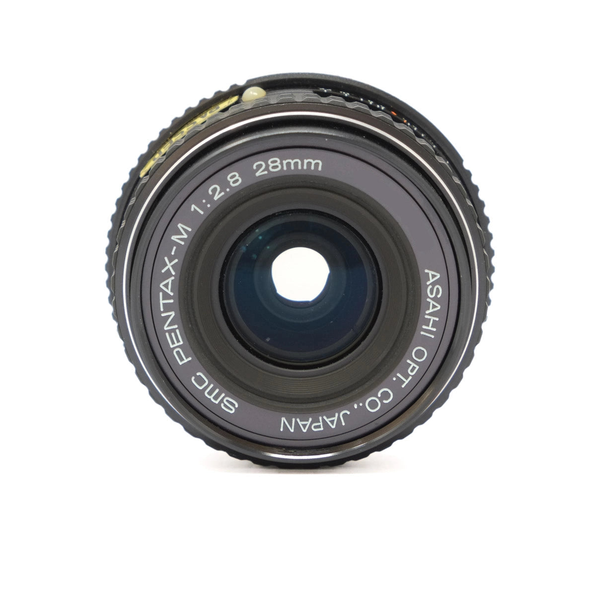 Pentax camera lens on a white background