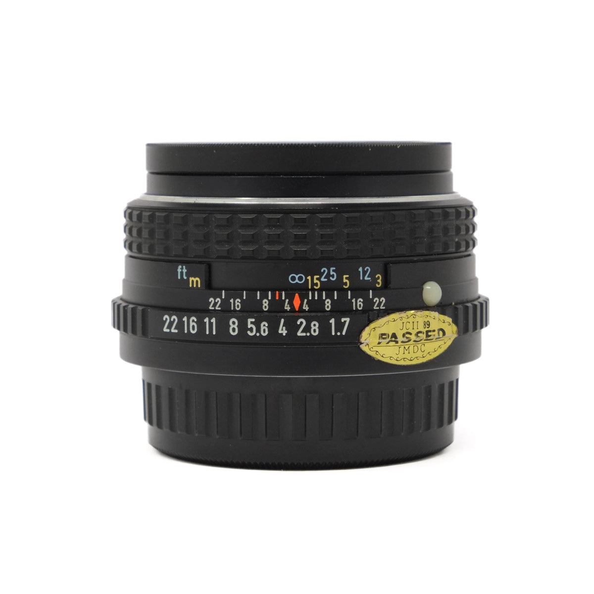 Camera lens with focus scale and markings on a white background
