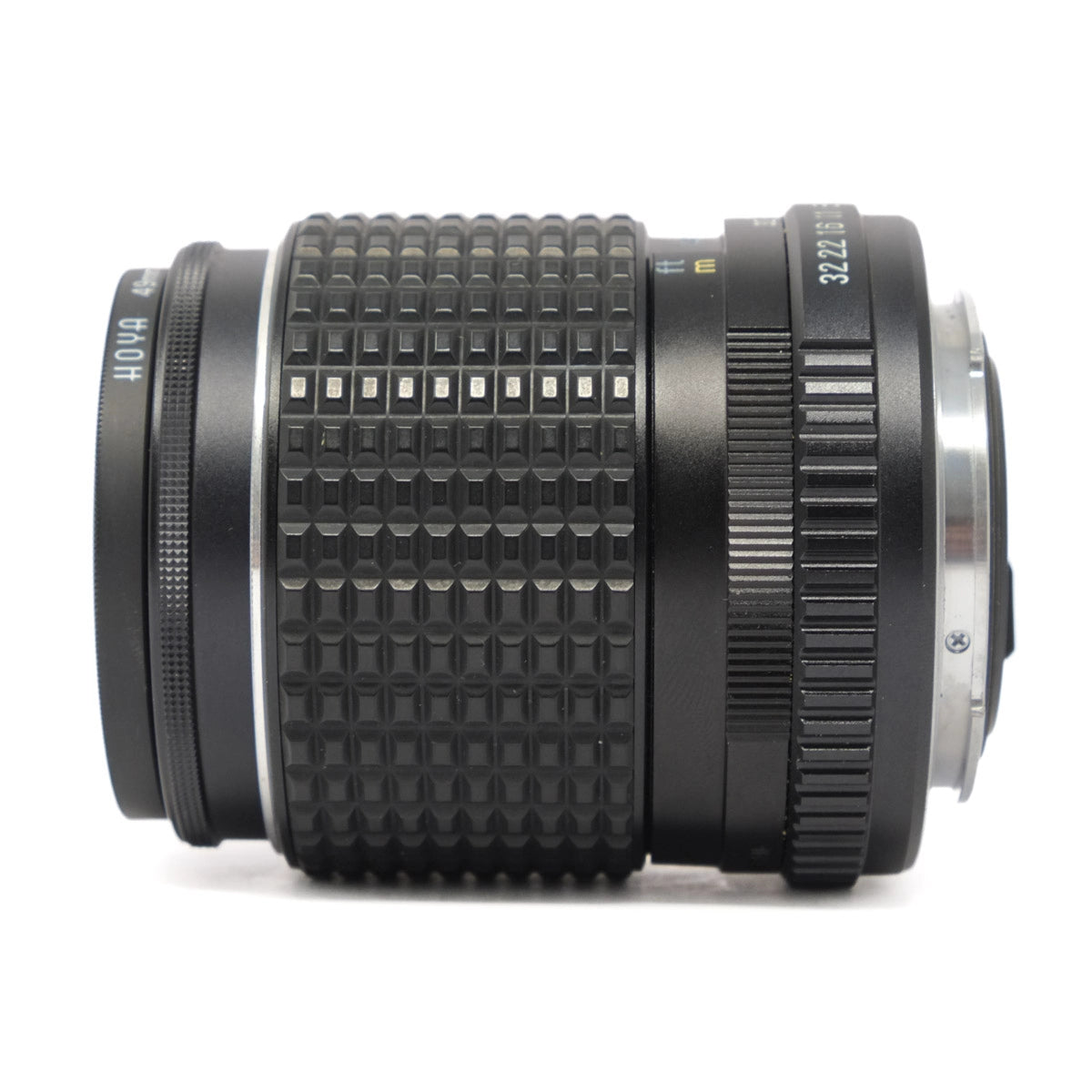 Camera lens with textured grip on a white background