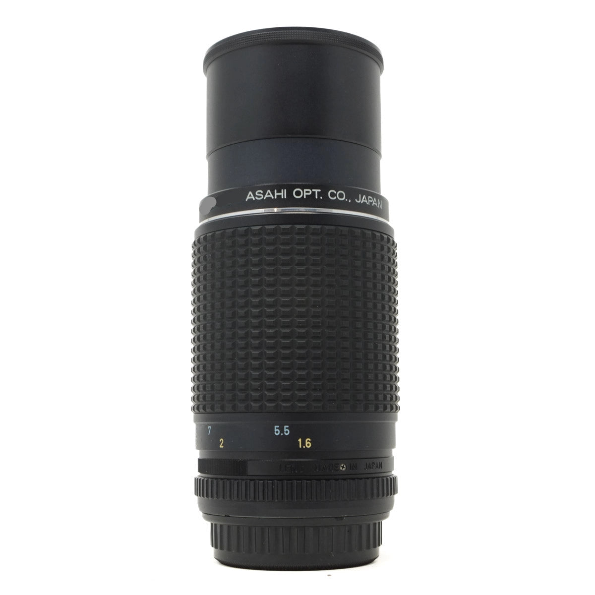 Black camera lens with text on a white background