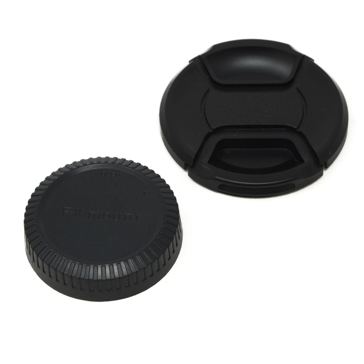 Camera lens cap and body cap on a white background