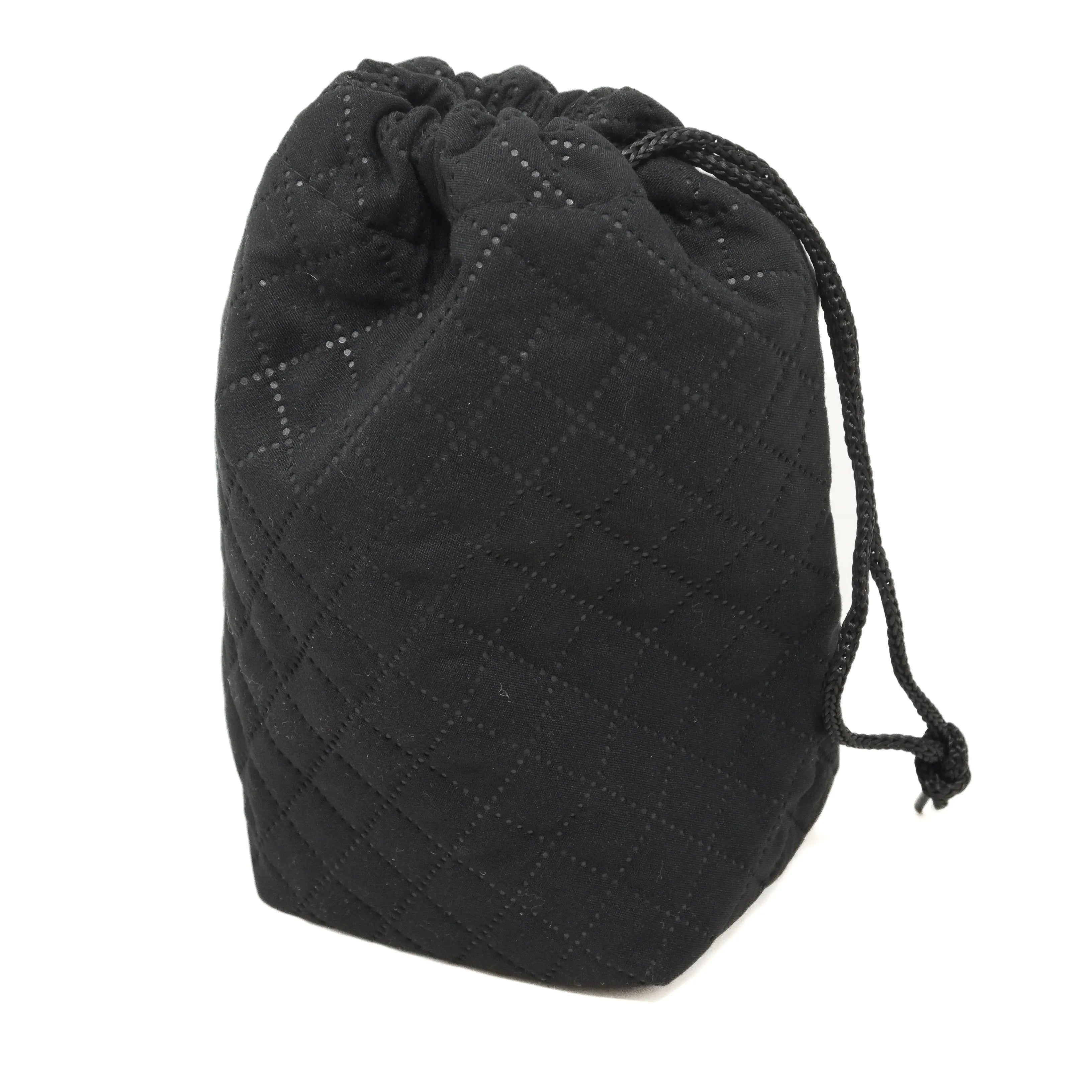 Black quilted drawstring bag on a white background