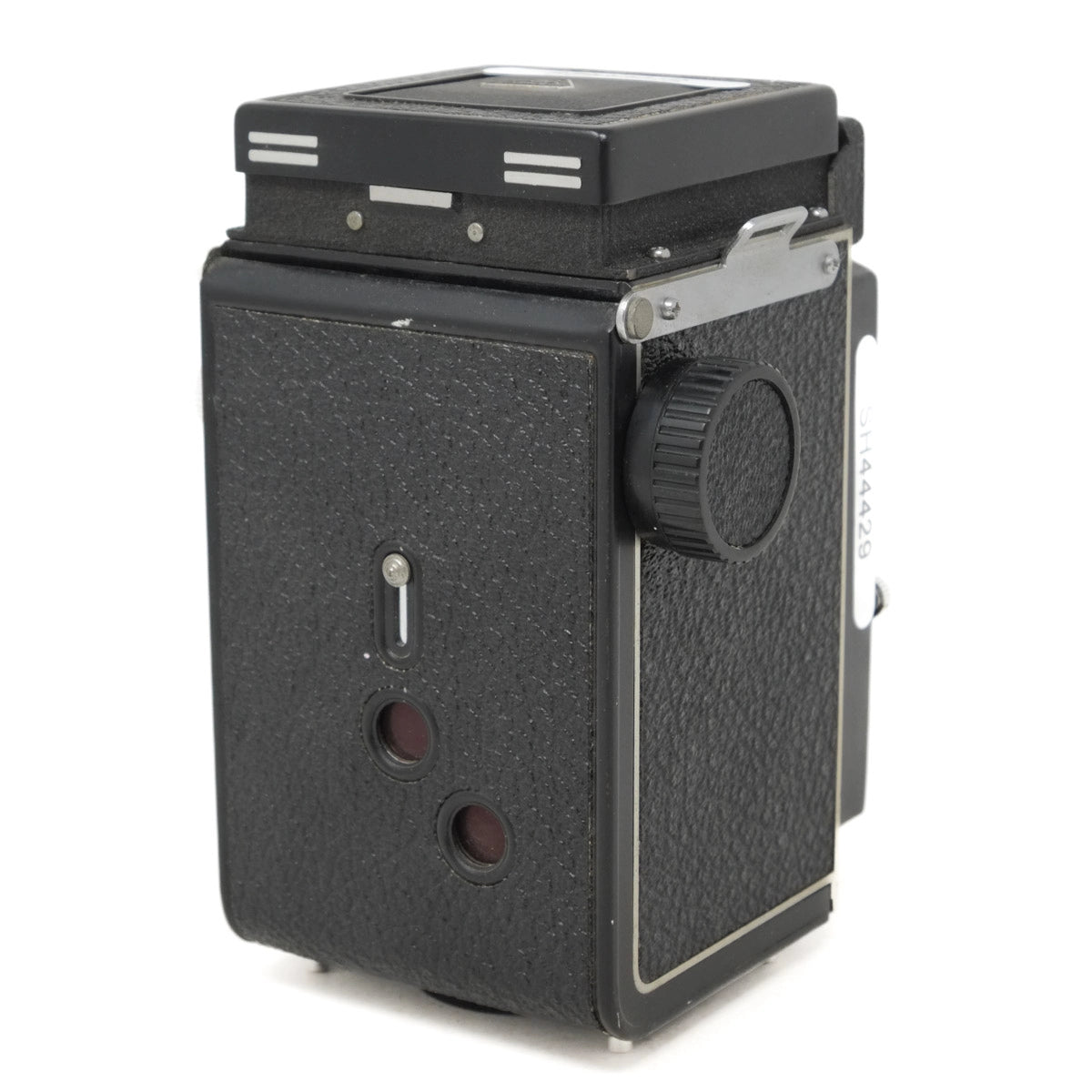 Vintage black camera with textured surface on a white background