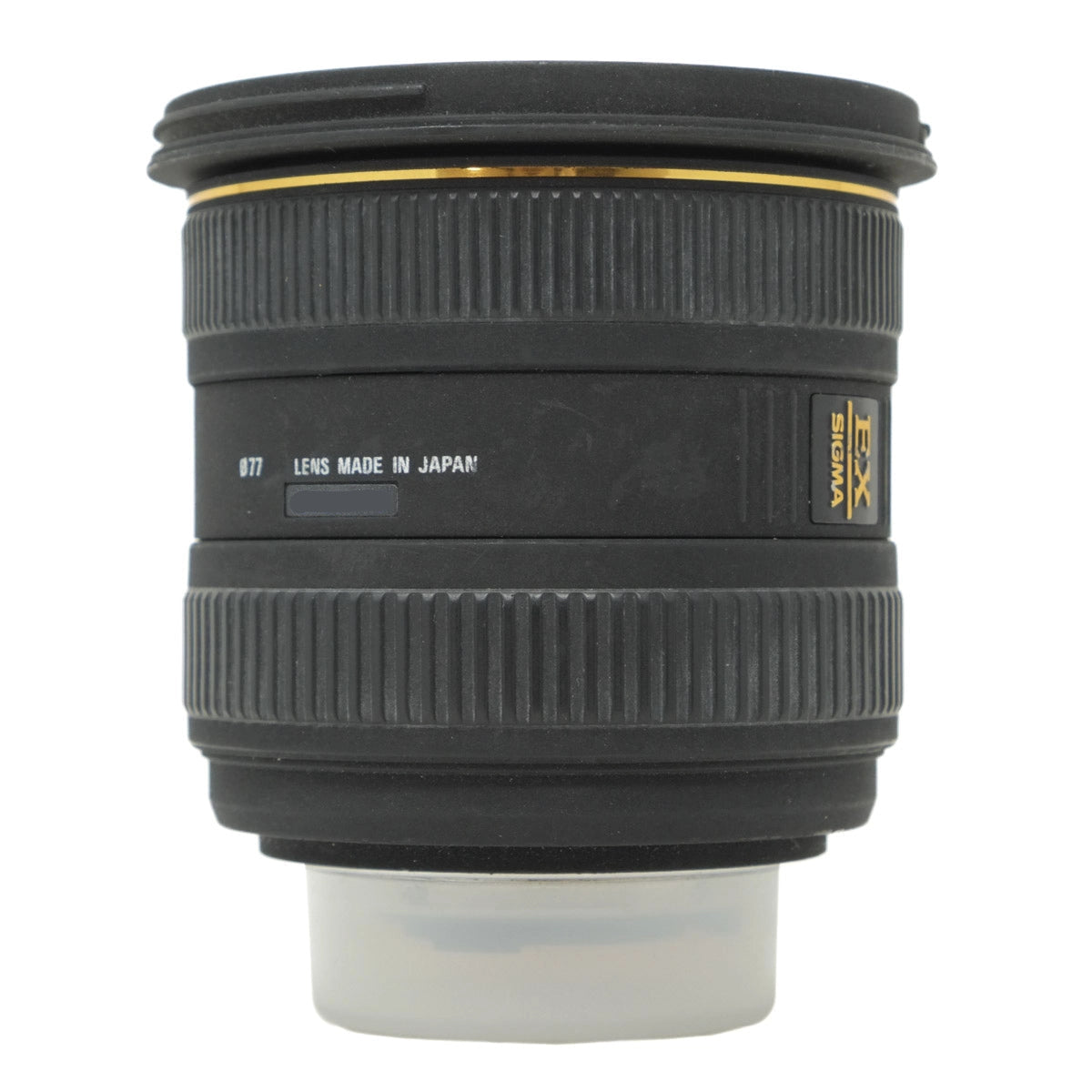 Camera lens with 'Made in Japan' text on a white background
