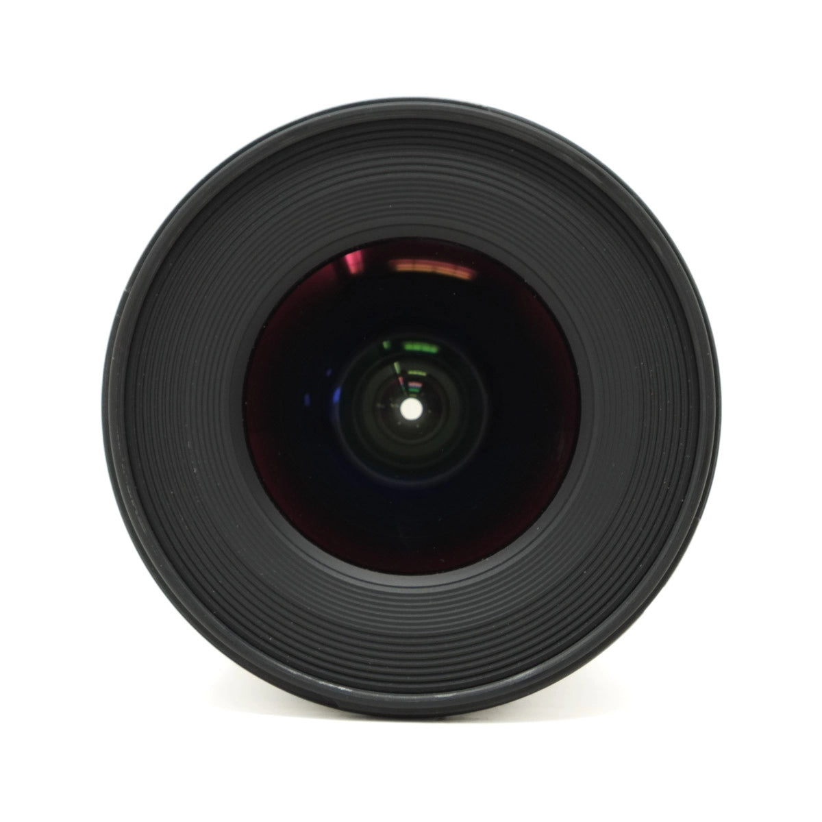 Black camera lens on a white background