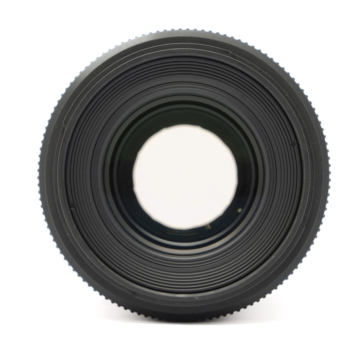 Black camera lens on a white background