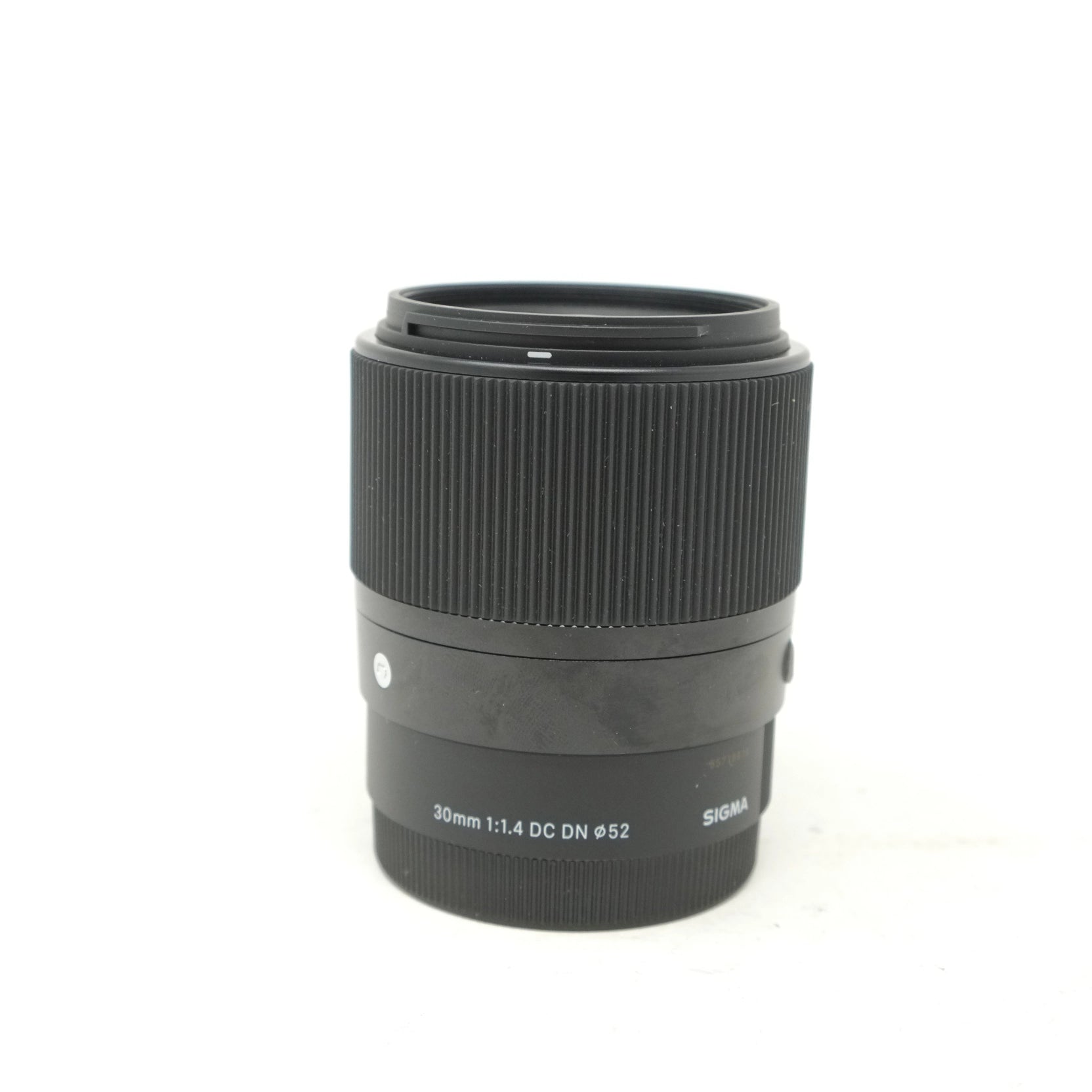 Camera lens with 'Sigma' branding on a white background