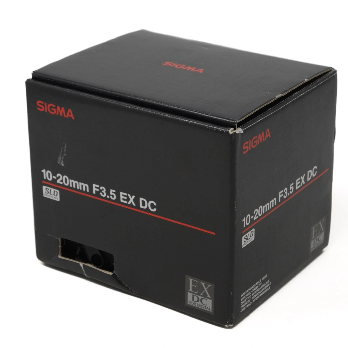 Black box packaging for Sigma camera lens with red and white text on a white background