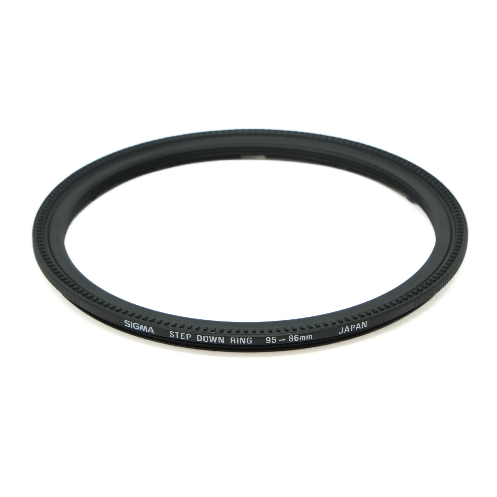 Sigma step-down ring 95-86mm on a white background