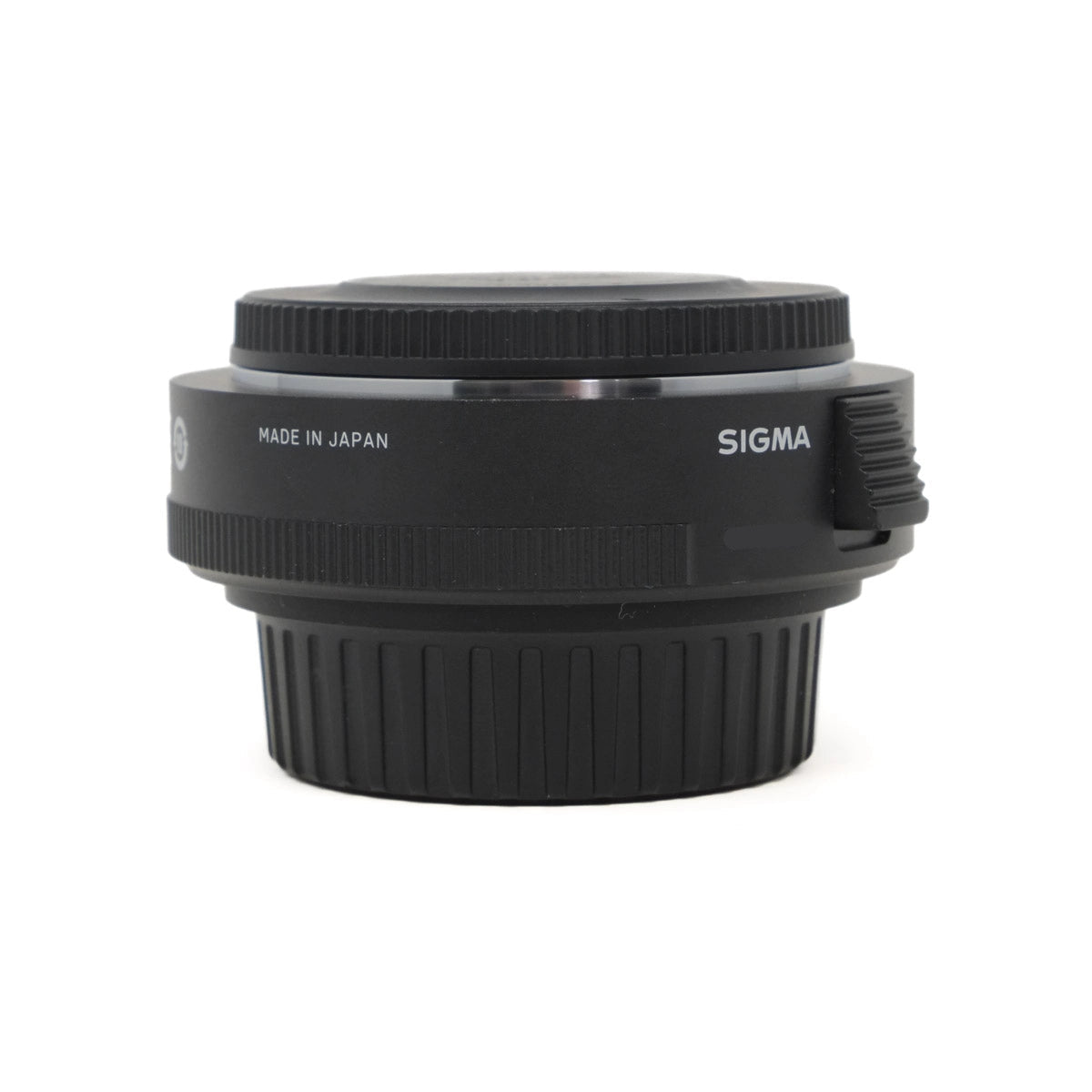 Sigma camera lens teleconverter on a white background