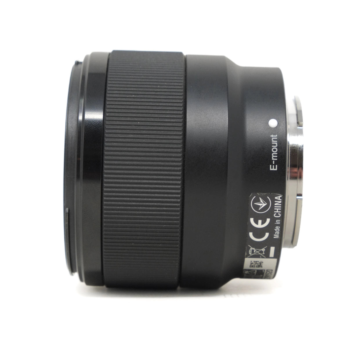 Camera lens with E-mount and CE logos on a white background