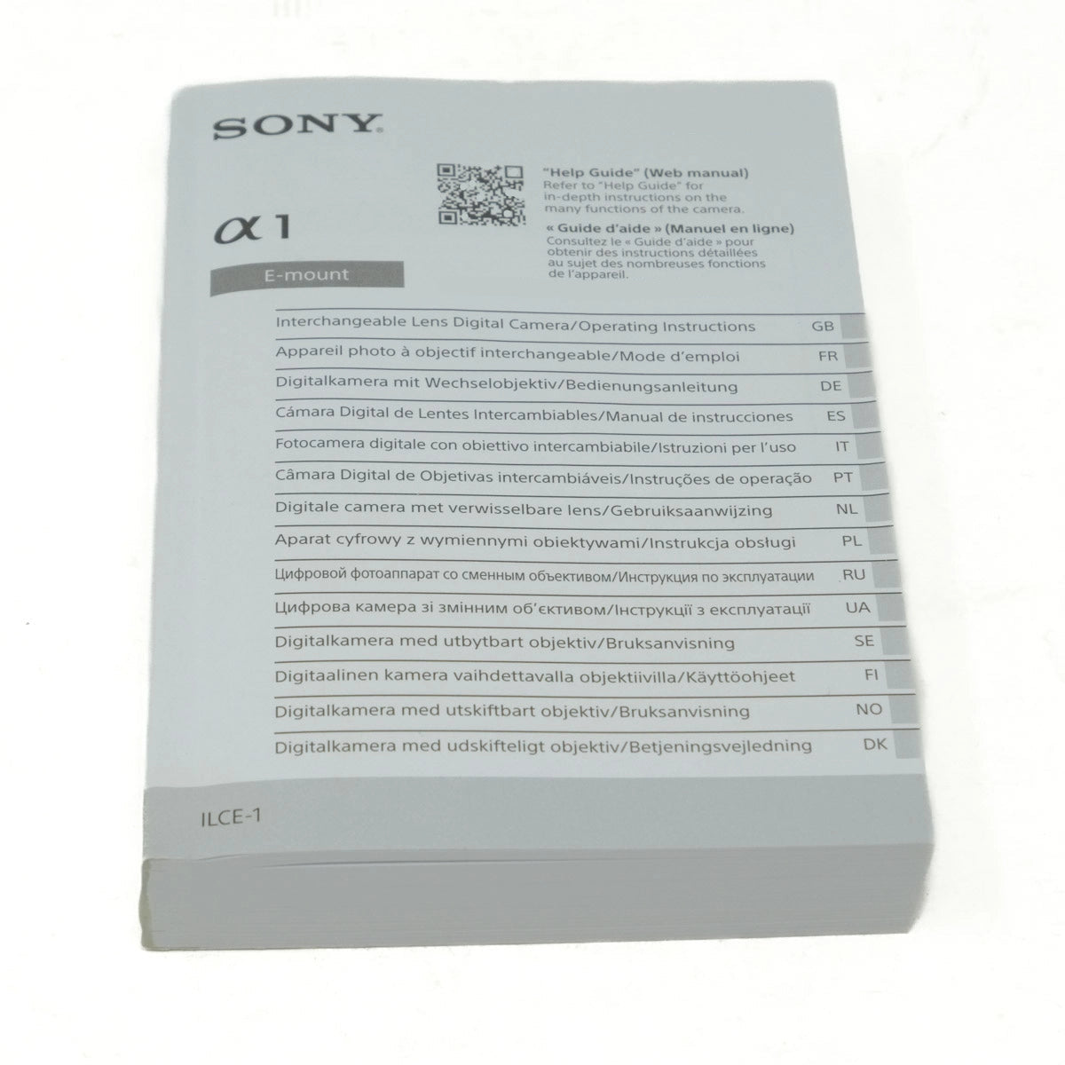 Sony camera manual packaging with multiple language text on a white background