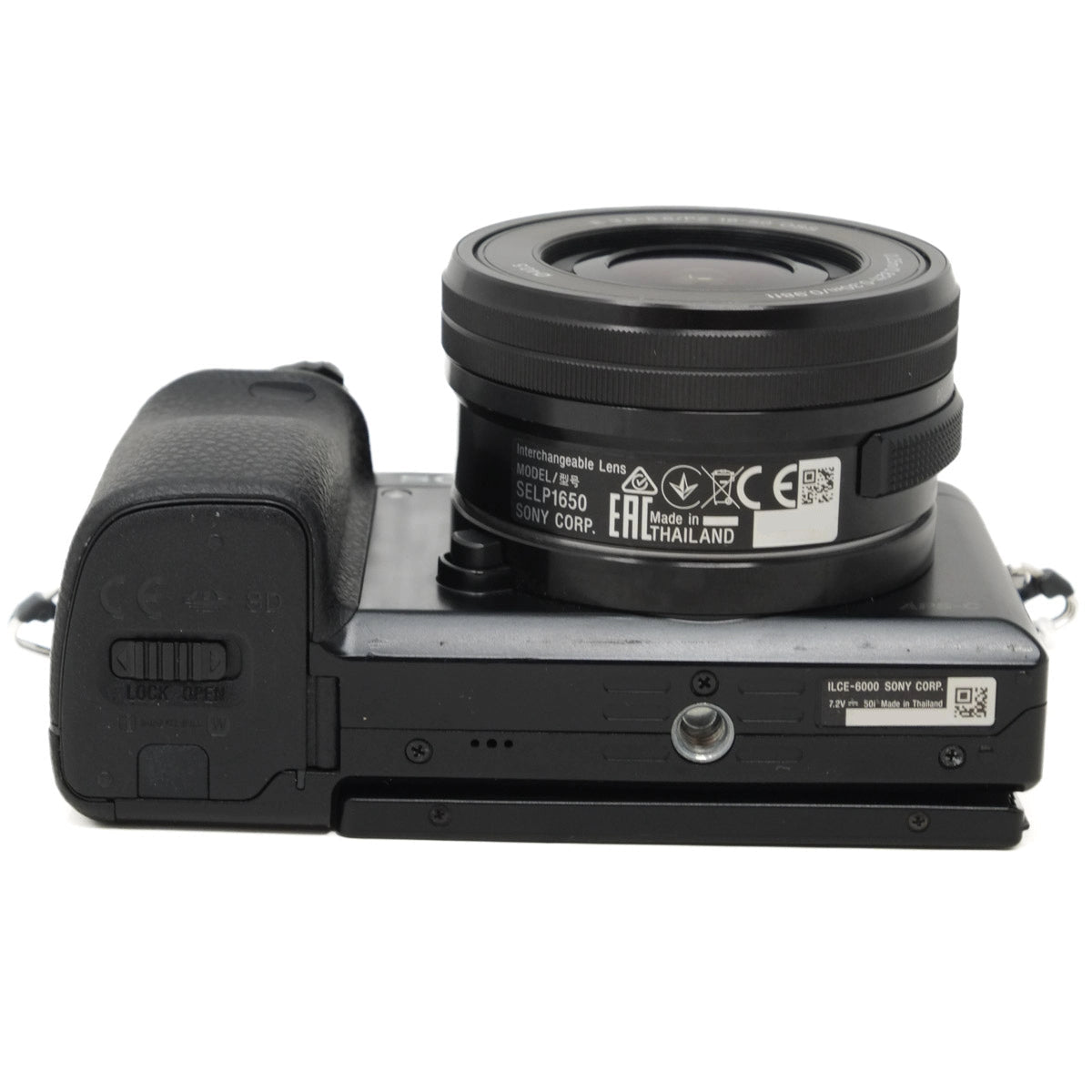 Camera lens with brand labels on a white background