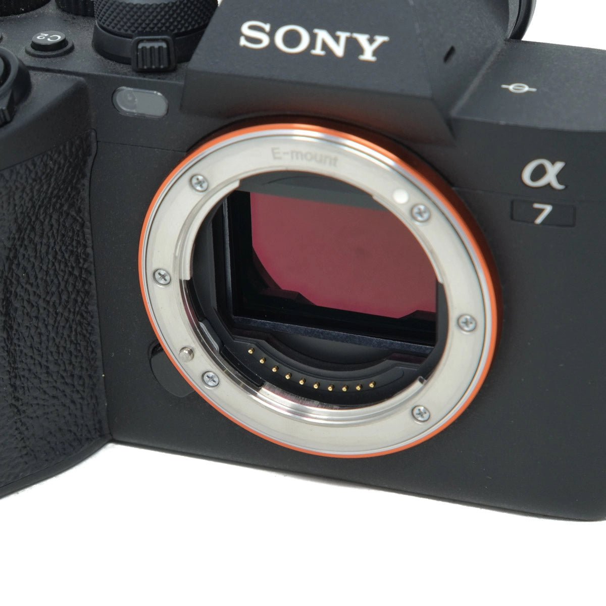 Sony camera body without a lens on a white background