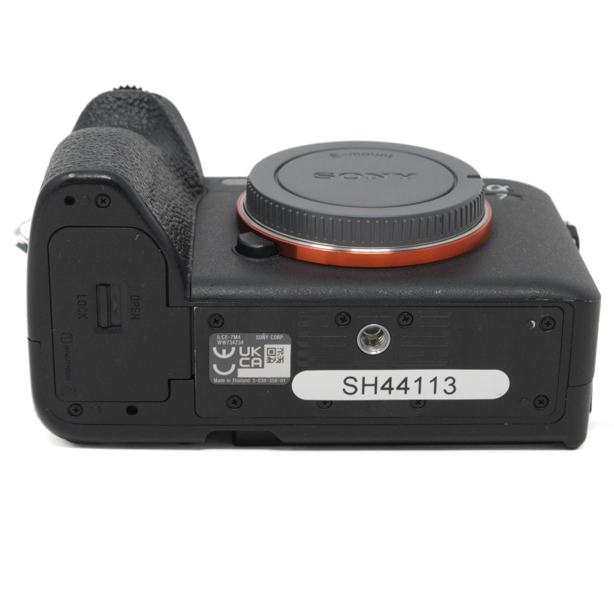 Bottom view of a Sony camera on a white background