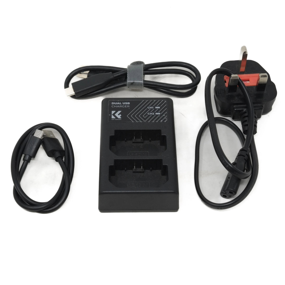 Black dual battery charger with cables on a white background