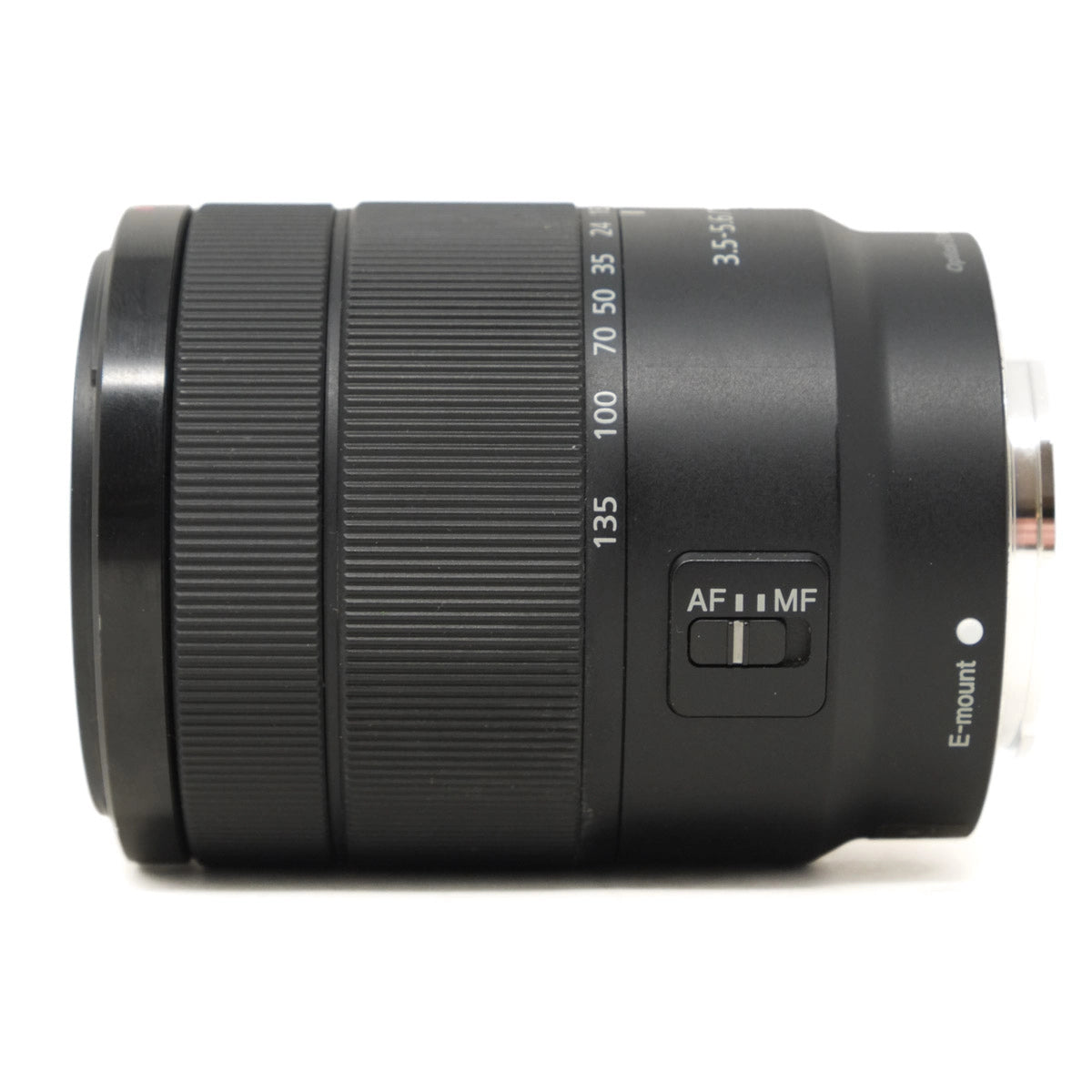 Camera lens with focus and aperture controls on a white background
