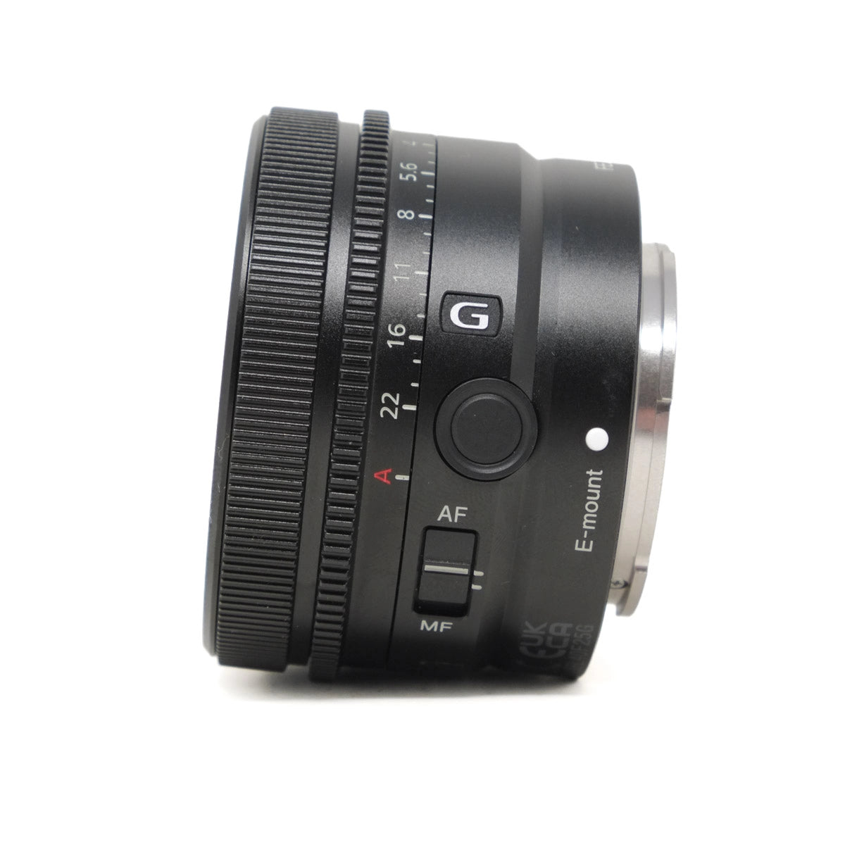 Camera lens with brand markings on a white background