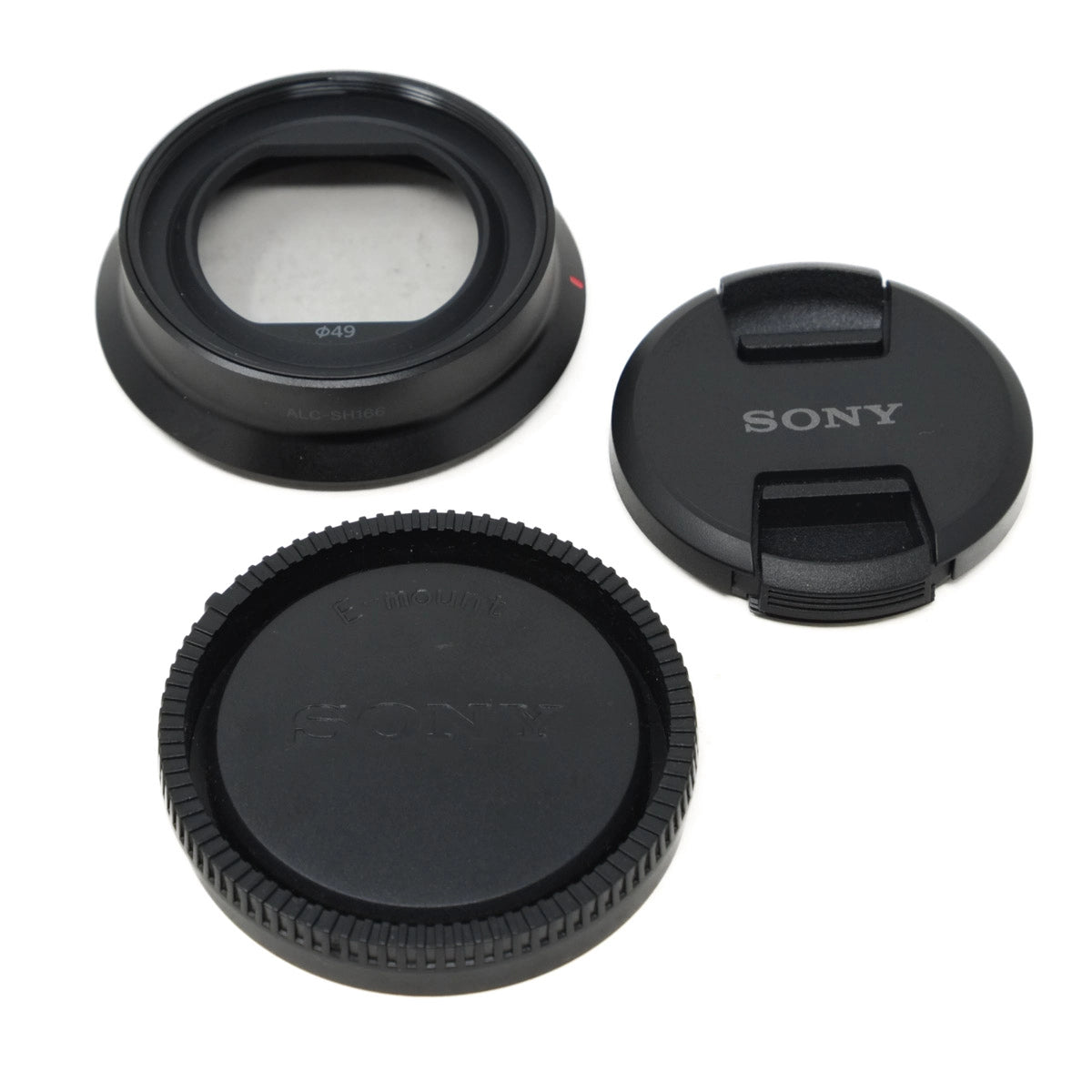 Sony camera lens components on a white background