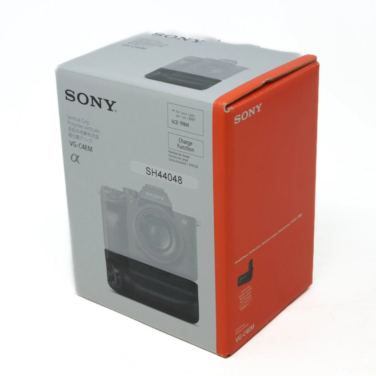 Sony camera packaging with orange and white design on a white background